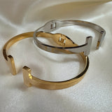 Tbangle gold/silver tone