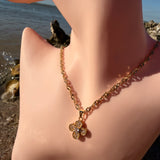 Four-leaf clover with pavé crystals CZ 18K GP