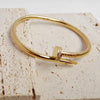 Princess CZ nail bangle in gold & silver